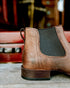 Back view of men's Ariat Booker Ultra Western Boot with stacked heel