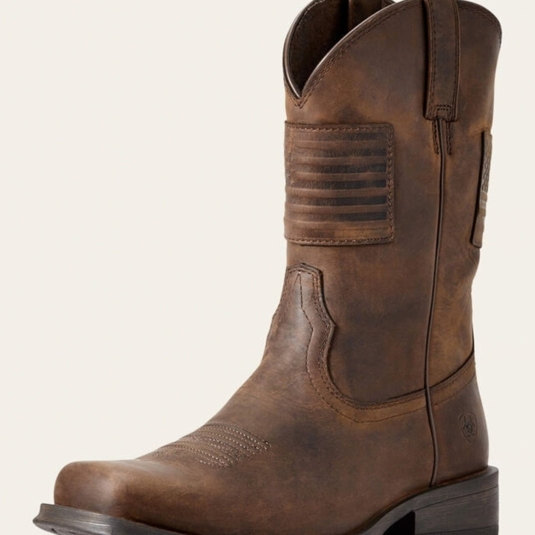 Ariat Rambler Patriot men's cowboy boot in distressed brown leather with embossed American flag patch